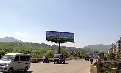 1616030616101258.jpg 江西省上栗市G319栗水河十字路口三面立柱广告1.jpg